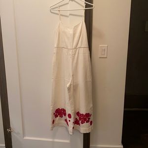 Club monaco white jumpsuit with floral trim